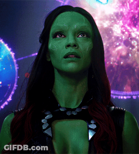 A Close Up Of A Woman With Green Face GIF