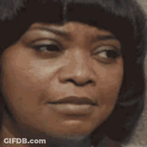 A Close Up Of A Woman With Her Eyes Closed Smiling . GIF