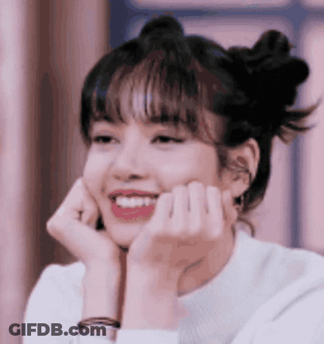 A Close Up Of A Woman With Her Hands On Her Face . GIF