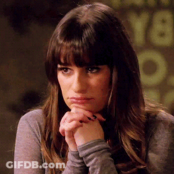 A Close Up Of A Woman With Her Hands On Her Face GIF