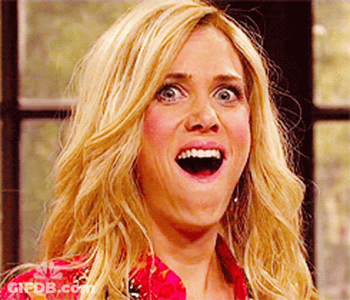 A Close Up Of A Woman With Her Mouth Open GIF