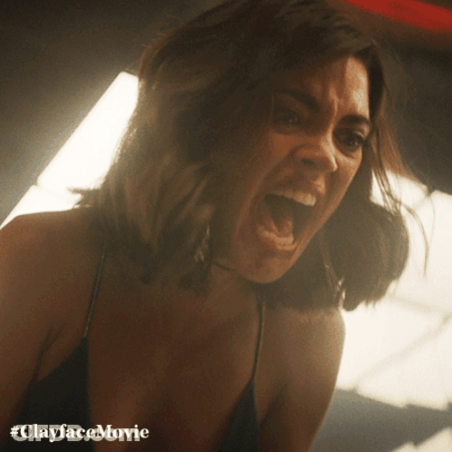A Close Up Of A Woman With Her Mouth Open And #Clayfacemovie Written On The Bottom GIF