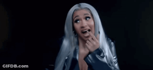 A Close Up Of A Woman With Long Blue Hair Smiling . GIF