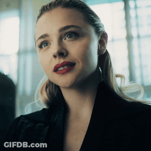A Close Up Of A Woman With Red Lips GIF
