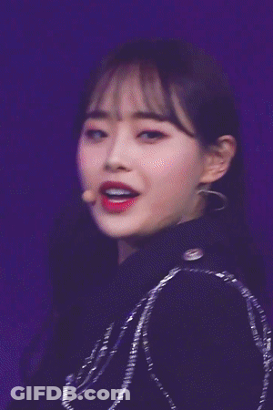 A Close Up Of A Woman With Red Lipstick On Her Lips GIF