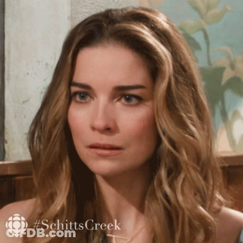 Close Up Of Woman With #Schittscreek Text GIF