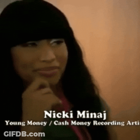 A Close Up Of A Woman With The Name Nicki Minaj On The Bottom GIF