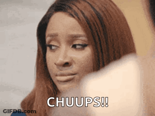 A Close Up Of A Woman With The Words Chuups Written On Her Face GIF