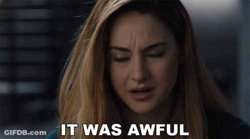 A Close Up Of A Woman With The Words It Was Awful Above Her GIF