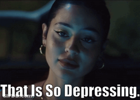 A Close Up Of A Woman With The Words That Is So Depressing Below Her GIF