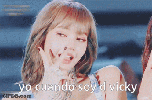 A Close Up Of A Woman With The Words Yo Cuando Soy D Vicky On The Bottom GIF