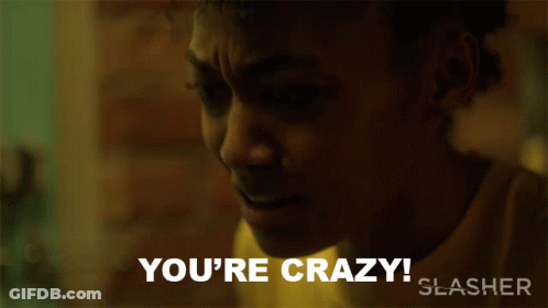 A Close Up Of A Woman With The Words You 'Re Crazy GIF