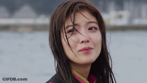 A Close Up Of A Woman With Wet Hair GIF