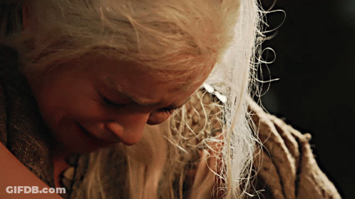 A Close Up Of A Woman With White Hair GIF