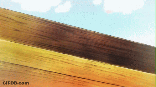 A Close Up Of A Wooden Fence With A Blue Sky In The Background GIF