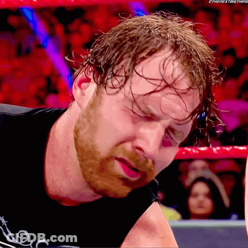 A Close Up Of A Wrestler 'S Face With The Words " The Next Thing " On The Bottom Right GIF