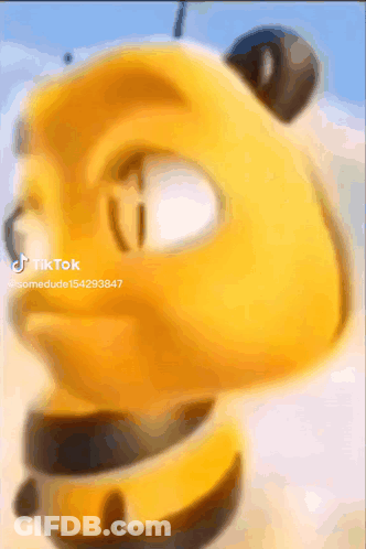 A Close Up Of A Yellow Cartoon Character 'S Face With A Blurred Background . GIF