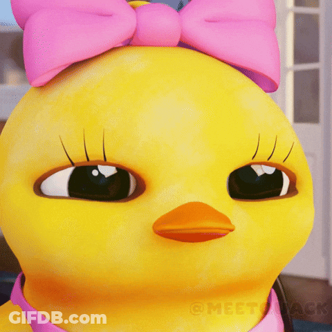 A Close Up Of A Yellow Duck With A Pink Bow GIF