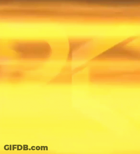 A Close Up Of A Yellow Sign That Says Pk On A Black Background . GIF