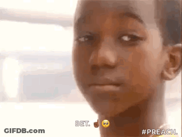 A Close Up Of A Young Boy 'S Face With A Smiley Face On His Neck . GIF