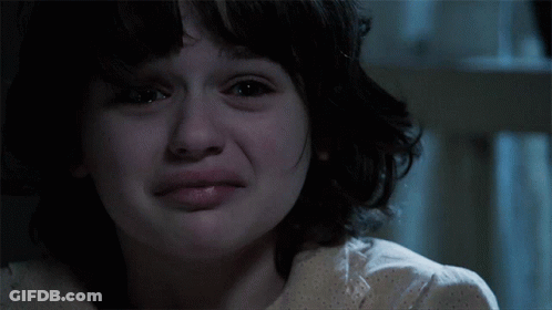 A Close Up Of A Young Girl 'S Face With Tears Running Down Her Face GIF