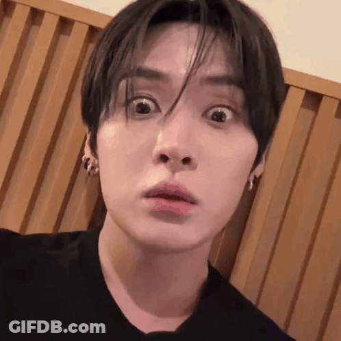 A Close Up Of A Young Man Making A Funny Face . GIF