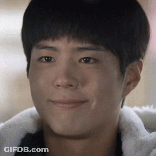A Close Up Of A Young Man 'S Face Smiling GIF