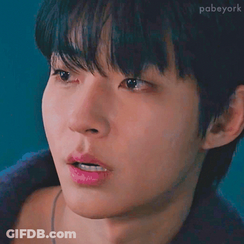 A Close Up Of A Young Man 'S Face With A Blue Background And The Hashtag Pabyork GIF