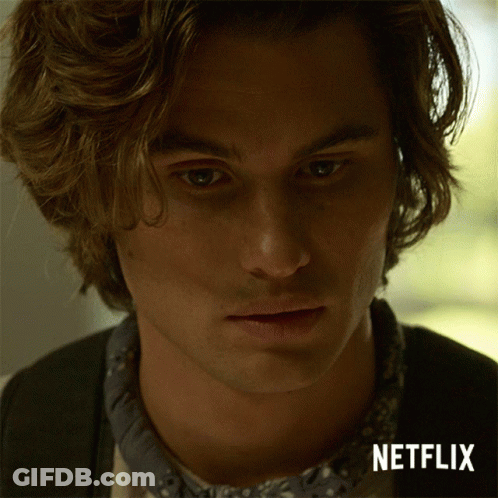 A Close Up Of A Young Man 'S Face With A Netflix Logo In The Corner GIF