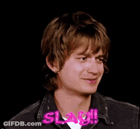 A Close Up Of A Young Man 'S Face With The Word Slay Written On His Neck . GIF