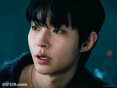 A Close Up Of A Young Man 'S Face With The Words Keyboifs Written Below Him GIF