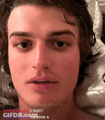A Close Up Of A Young Man 'S Face With The Words " U Aight " On The Bottom Right GIF