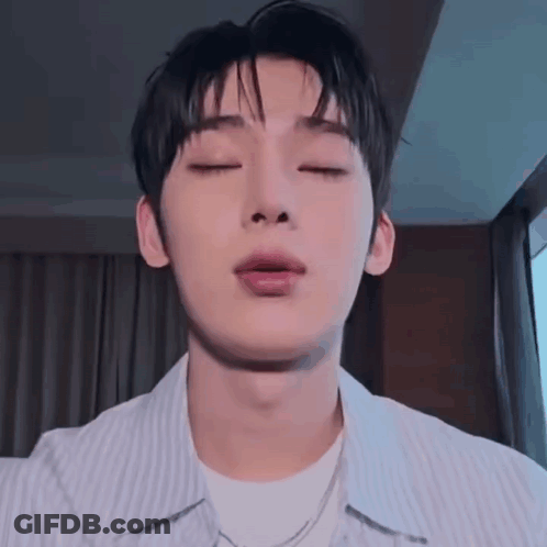 A Close Up Of A Young Man With His Eyes Closed . GIF