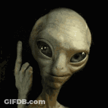 A Close Up Of An Alien Making A Middle Finger Sign GIF