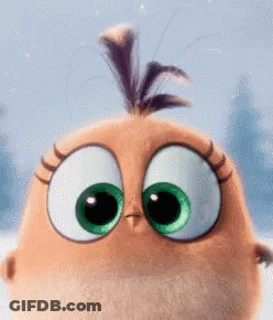 A Close Up Of An Angry Birds Character With Big Green Eyes GIF