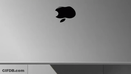 A Close Up Of An Apple Logo On A Laptop . GIF