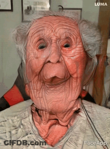 A Close Up Of An Elderly Woman 'S Face With Luma Written On The Bottom Right GIF