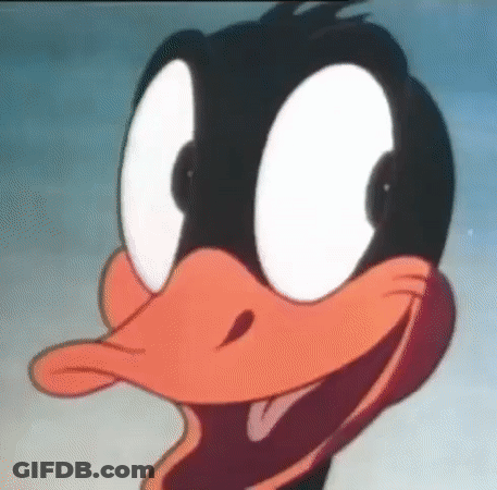 A Close Up Of Daffy Duck 'S Face With Big White Eyes GIF