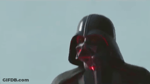 A Close Up Of Darth Vader 'S Face With A Red Background . GIF