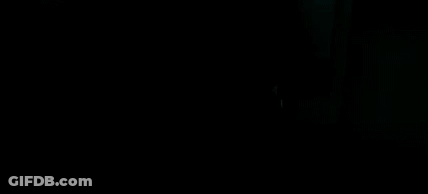 A Close Up Of Darth Vader 'S Skull In The Dark With A Knife In His Mouth . GIF