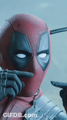 A Close Up Of Deadpool 'S Face With The Words " Everything You Need " Written On The Bottom GIF