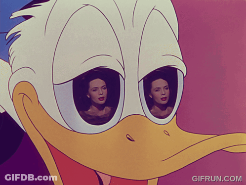 A Close Up Of Donald Duck 'S Face With Two Women Behind His Eyes GIF