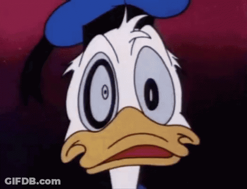 A Close Up Of Donald Duck With Big Eyes GIF