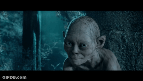 A Close Up Of Gollum From The Lord Of The Rings Looking At The Camera GIF
