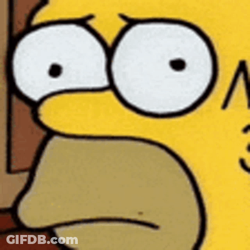 A Close Up Of Homer Simpson 'S Face With A Surprised Expression . GIF
