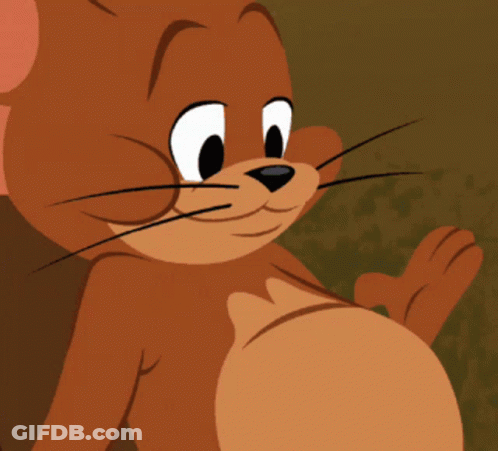 A Close Up Of Jerry From Tom And Jerry Looking At The Camera GIF