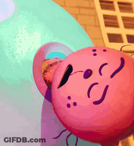 A Close Up Of Kirby 'S Face With A Smiley Face GIF