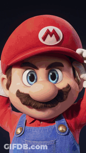 A Close Up Of Mario Wearing Overalls And A Red Hat With A M On It GIF
