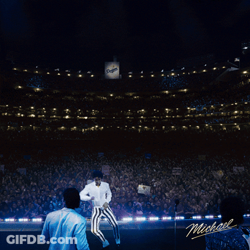 A Close Up Of Michael Jackson 'S Face With A White Shirt GIF