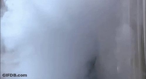 A Close Up Of Smoke Coming Out Of A Container GIF